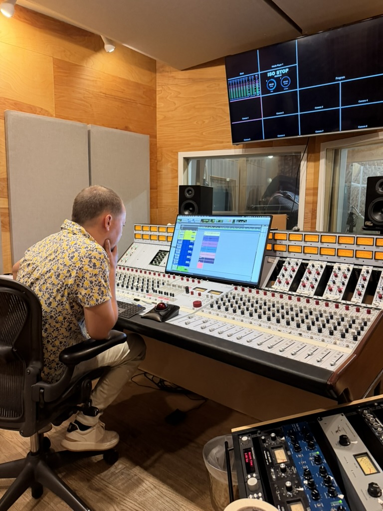 Producer at the mixing console