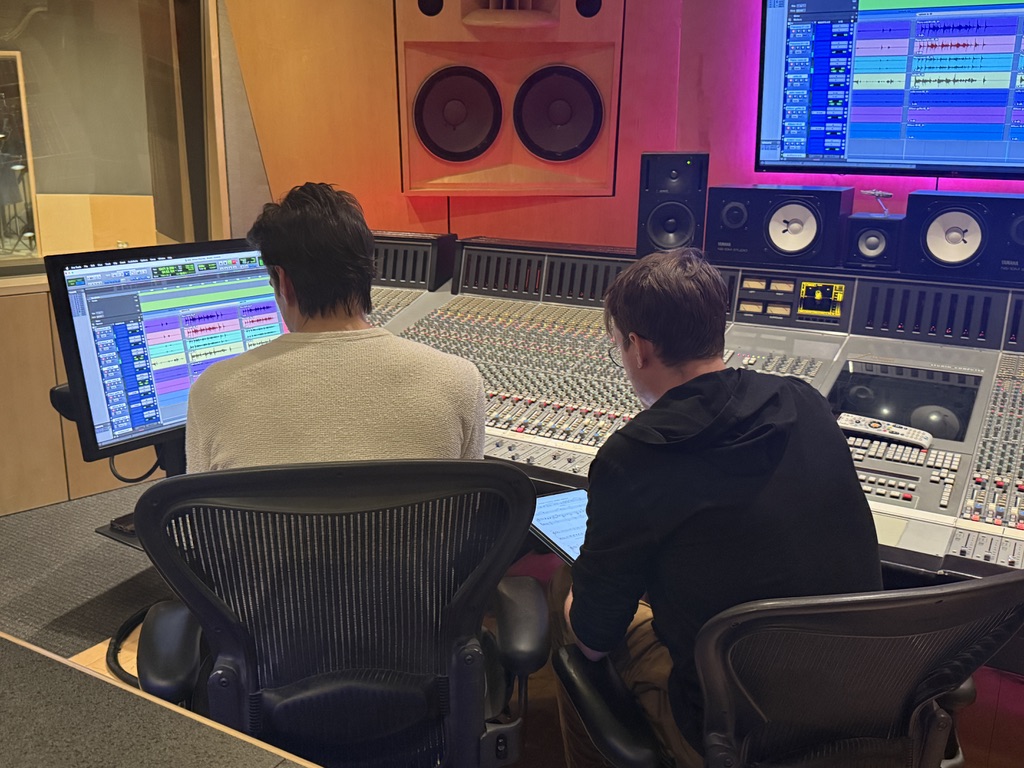 Engineers working at the console